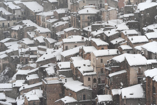 The medieval village of Pacentro under heavy snowfall  with snow covered house, Pacentro municipality, Maiella national park, L’aquila province, Abruzzo, Italy