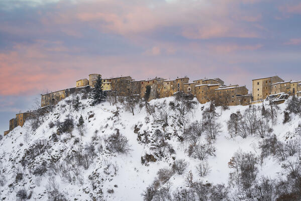 Panoramic view after snowfall at the sunset of the old village of Villalago, Abruzzo national park, L’aquila province, Abruzzo, Italy