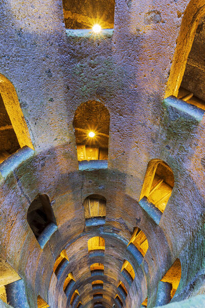 Illuminated view of the Saint Patrick's well with a spiral staircase, Orvieto, Terni province, Umbria region, Italy, Europe