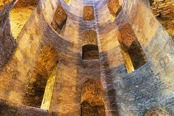 Illuminated view from inside to the top of the Saint Patrick's well with a spiral staircase, Orvieto, Terni province, Umbria region, Italy, Europe