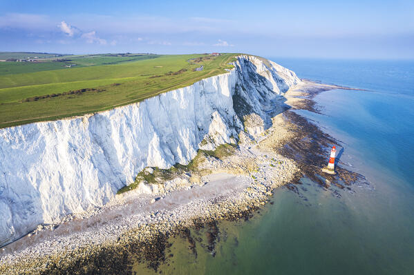 Beachy Head lighthouse and chalk white cliffs, aerial view, Seven Sisters Country Park, South Downs National Park, Sussex, England, United Kingdom, Europe