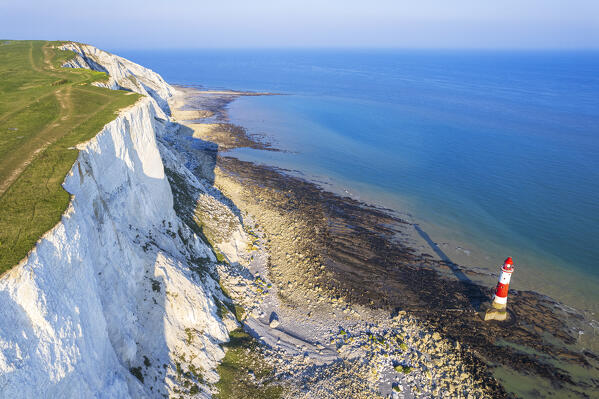 Drone view of Beachy Head lighthouse and chalk white cliffs, Seven Sisters Country Park, South Downs National Park, Sussex, England, United Kingdom, Europe