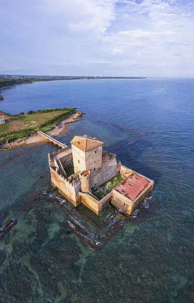 Aerial view of Astura tower built on top of roman ruins at sunset, Torre Astura castle, Nettuno municipality, Rome province, Latium, Tyrrhenian sea, Italy, Europe
