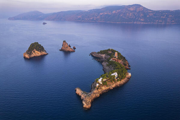 Aerial sunrise view of Li Galli islands (Gallo Lungo, La Rotonda e La Castelluccia), the sirens archipelago, with the island dolphin shape off Positano coast, Positano municipality, Amalfi coast, Salerno province, Campania region, Mediterranean Sea, Italy