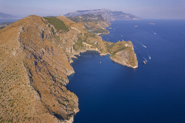 High angle view of the rocky coast and the blue water of Punta Campanella with the Ieranto bay in the foreground, Punta Campanella, Ieranto bay, Nerano, Massa Lubrense municipality, Amalfi coast, Naples province, Campania region, Tyrrhenian sea, Italy