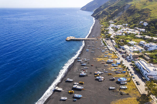 Black lava beach and the small harbour of Stromboli with fishing boats ashored,  drone view, Stromboli island, UNESCO World Heritage Site, Aeolian Islands, Sicily, Tyrrhenian Sea, Mediterranean Sea, South of Italy, Italy, Southern Europe, Europe