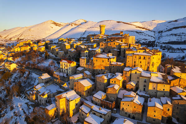 Mountai village of Santo Stefano di Sessanio covered with snow at sunrise, Gran Sasso and Laga Mountains National Park, L'Aquila province, Abruzzo, Apennines, Italy