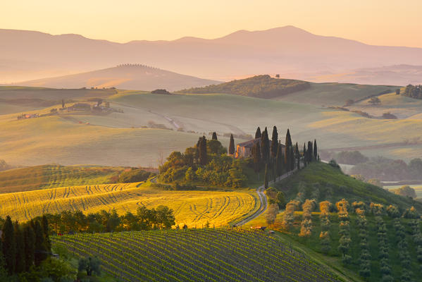 Europe. Italy. Tuscany. Siena District. Orcia Valley. Belvedere farmhouse at sunrise