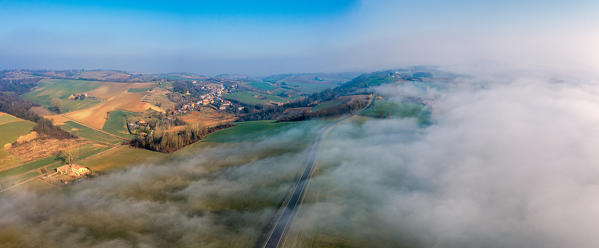 Panoramic aerial view of Alessandria hills with fog, Alessandria province, Piedmont, Italy, Europe. 