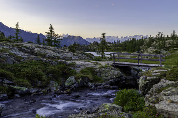 Lake Bianco at sunset, Mont Avic, Aosta province, Valle D'Aosta, Italy, Europe.