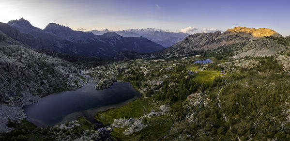 Panoramic aerial view of Lake Bianco and Vallette at sunset, Mont Avic, Aosta province, Valle D'Aosta, Italy, Europe.