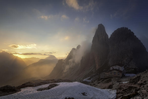 The refuge Fonda Savio in the Cadini mountain group at sunset. Cadini di Misurina, Belluno, Veneto, Dolomiti, Italy.