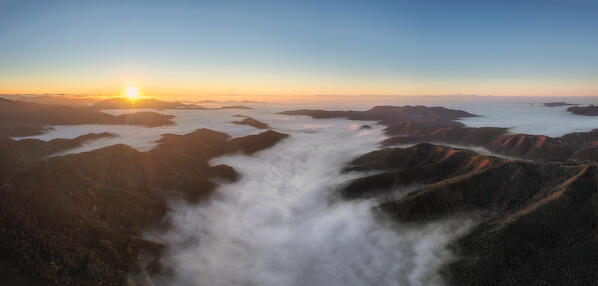 Panoramic aerial view of Alessandria hills with fog, Alessandria province, Piedmont, Italy, Europe. 