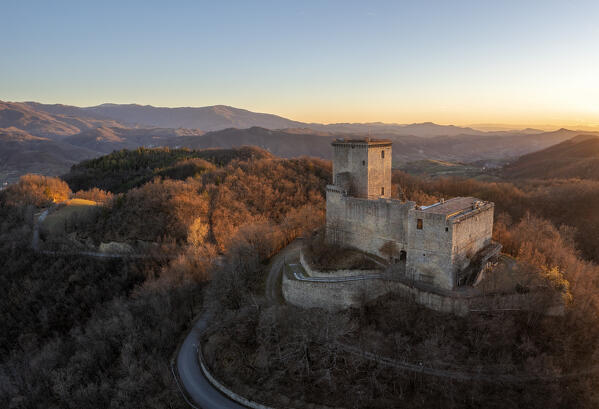 Aerial view of the castle of Oramala at sunset. Varzi, Oltrepo wine region, Oltrepo pavese, Lombardy, Italy, Europe.