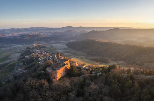 Aerial view of the medieval town of Camino Monferrato and its castle at sunset. Camino, Monferrato wine region, MOnferrato, Piedmont, Italy, Europe.