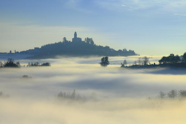 Montecastello, Piedmont, Italy. Hills of Alexandria in the fog.