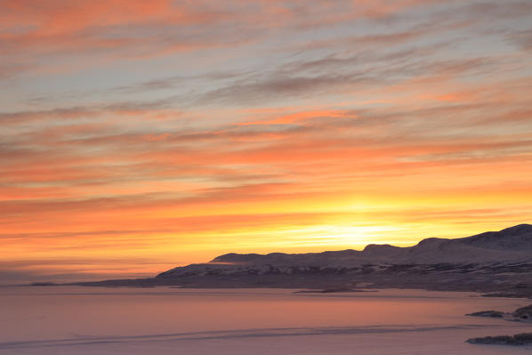 Sunrise on the snowy landscape, Bjorkliden, Abisko, Kiruna Municipality, Norrbotten County, Lapland, Sweden