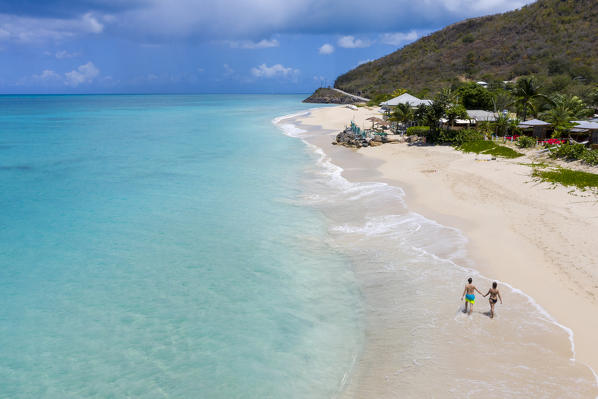 Idyllic tropical Turners beach with white sand, turquoise ocean water, Antigua island in Caribbean