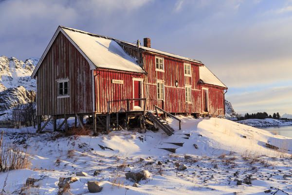 Rustic barn against the morning sun,Henningsvær Fishing village, Lofoten Islands, Norway