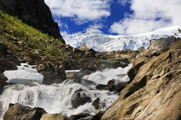 Waterfall on the path to Buer Glacier in Folgefonna National Park, Odda, Hordaland, Norway