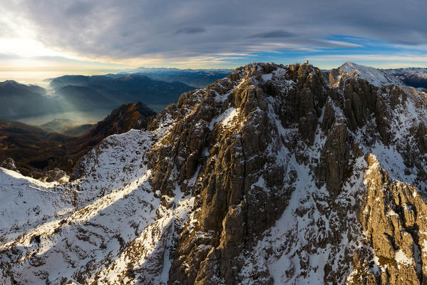 Panoramic view on the summit of mount Grigna Meridionale at sunset in winter, grigna meridionale, province of lecco, lombardy, italy, europe