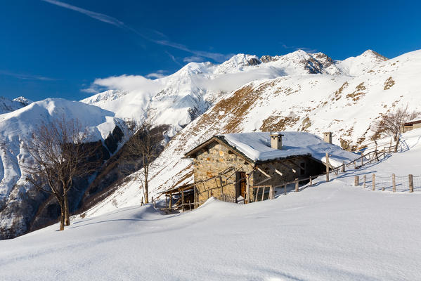 Alpe Motta with Mount Monte Duria in the background in winter, Bodone, Peglio, Province of Como, Lombardy, Italy, Europe 