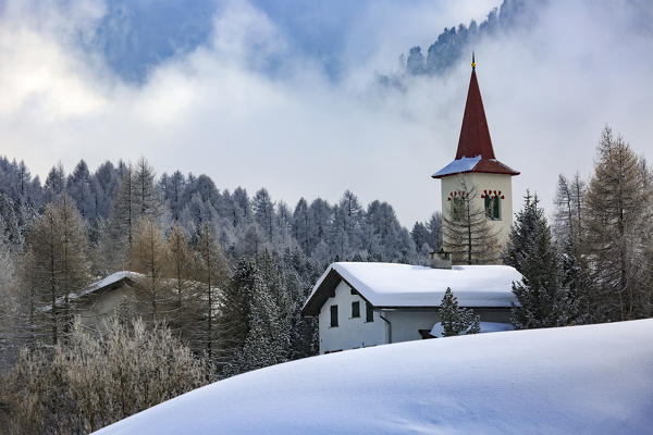 Church Chiesa Bianca in winter, Maloja, Engadin, Canton Grisons, Switzerland, Europe