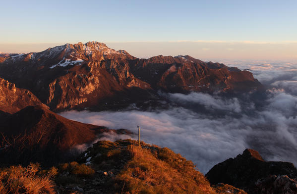 Sunset from Mount Coltignone toward Resegone di Lecco at sunset in winter, piani dei resinelli, abbadia lariana, province of lecco, lombardy, italy, europe