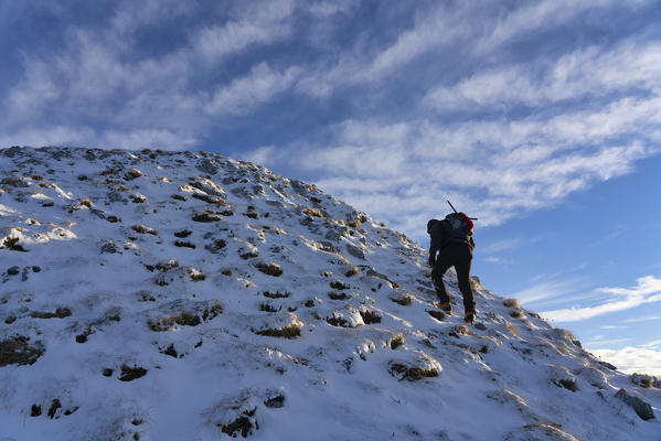 Italy, Umbria, Apennines, Mount Acuto, Hiker in Winter
