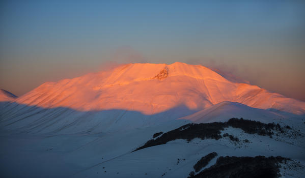 Mount Vettore at sunset, winter day with snow, Sibillini mountains NP, Umbria, Italy