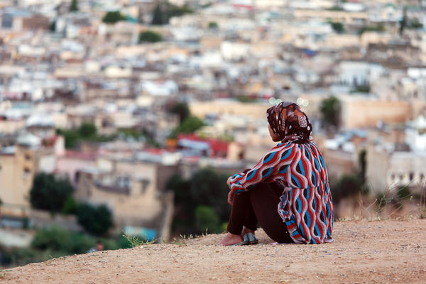 North Africa,Morocco,Fes district, Medina of Fes. Local Girl on prayer times