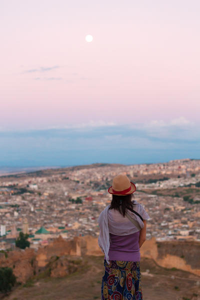 North Africa,Morocco,Fes district, Medina of Fes. Girl looking at city view