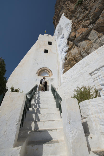 Amorgos island, Cyclades, Greece, Europe. The ancient monastery of Hozoviotissa has been built on the mountain rocks.