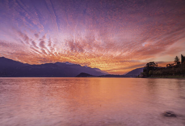 Burning sky at dawn over Lake Como, in Griante,Lombardy, Italy,europe.