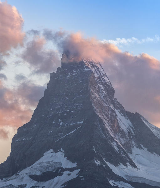 Matterhorn surrounded by clouds. Zermatt Canton of Valais Pennine Alps Switzerland Europe
