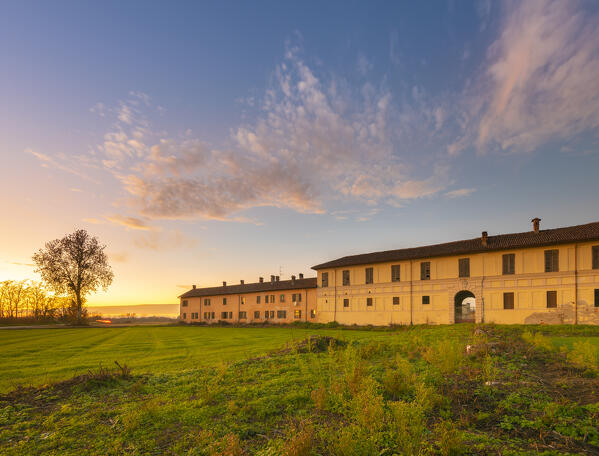 Farmhouse in the sunset, Dorno, Lomellina, province of Pavia, Lombardy, Italy