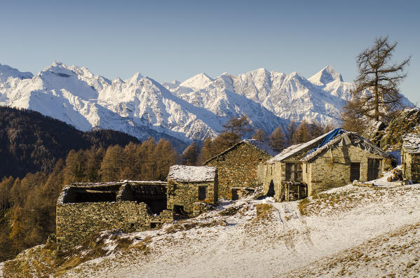 An abandoned little village, with the ridges of central valley of Vallée d'Aoste. (Val d'Ayas, Vallée d'Aoste, Italy)