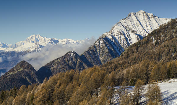 Different ridges in front of me: first, the hardest east ridge of Zerbion, and over the clouds, in the background, Mont Blanc. (Val d'Ayas, Vallée d'Aoste, Italy)
