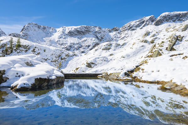 A little irrigator basin in high Alleigne valley, Champorcher valley, Aosta Valley, italian alps, Italy