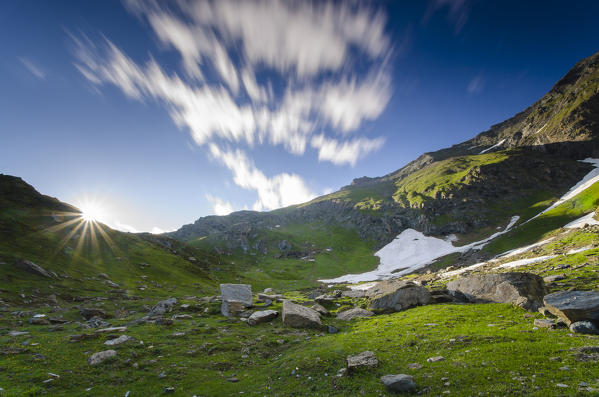 Clouds and sun in the valley (Val Soana, Gran Paradiso National Park)