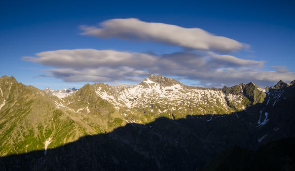 Sunrise with clouds in motion on the peaks (Val Soana, Gran Paradiso National Park)