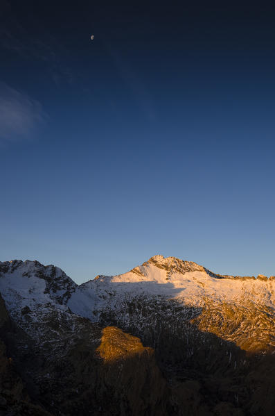 Torre di Lavina and moon (Soana Valley, Gran Paradiso National Park, Piedmont, Italy)