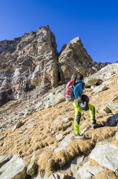 Hikers in Valley of Solcio, Val Divedro, Ossola, Piedmont, Italian alps, Italy