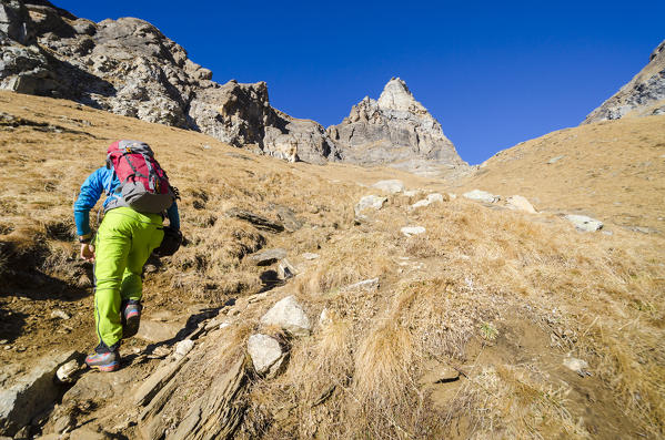 Alpinist under Scheggia di Marsasca, Val Divedro, Ossola, Piedmont, Italian alps, Italy