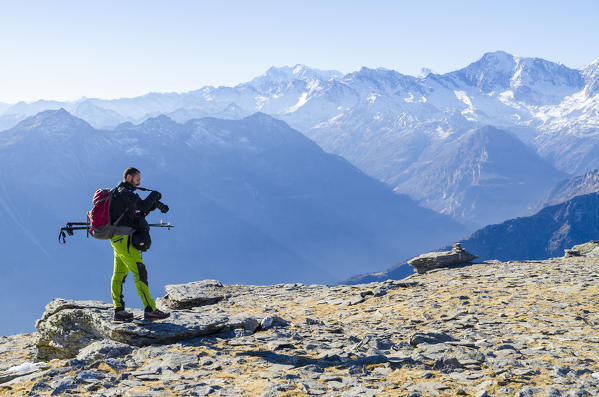 Hiker on Cistella plateau, Val Divedro, Ossola, Piedmont, Italian alps, Italy