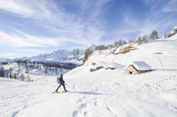 Hiker at Alpe Sangiatto, Alpe Devero, Ossola, Piedmont, Italian alps, Italy