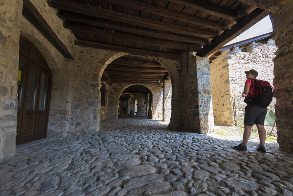The ancient arcade of the market in Cornello dei Tasso, along Via Mercantorum, Val Brembana, Province of Bergamo, Orobie alps, Italian alps, Italy