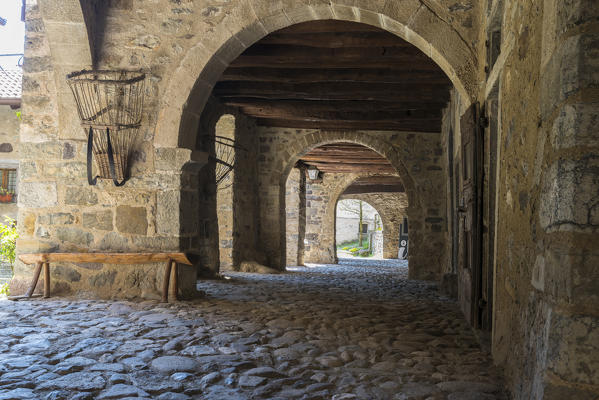 The ancient arcade of the market in Cornello dei Tasso, along Via Mercantorum, Val Brembana, Province of Bergamo, Orobie alps, Italian alps, Italy