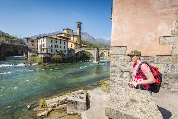 Hiker in San Giovanni Bianco, Val Brembana, Province of Bergamo, Orobie alps, Italian alps, Italy