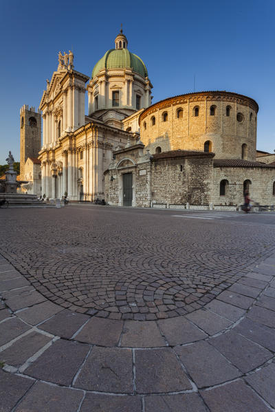 Brescia, Lombardy, Italy. The last rays of sunset illuminated the Brescia's cathedral under a blue sky